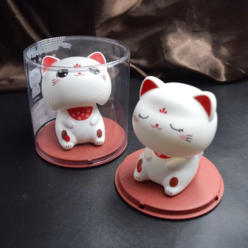 Gatto portafortuna movimento