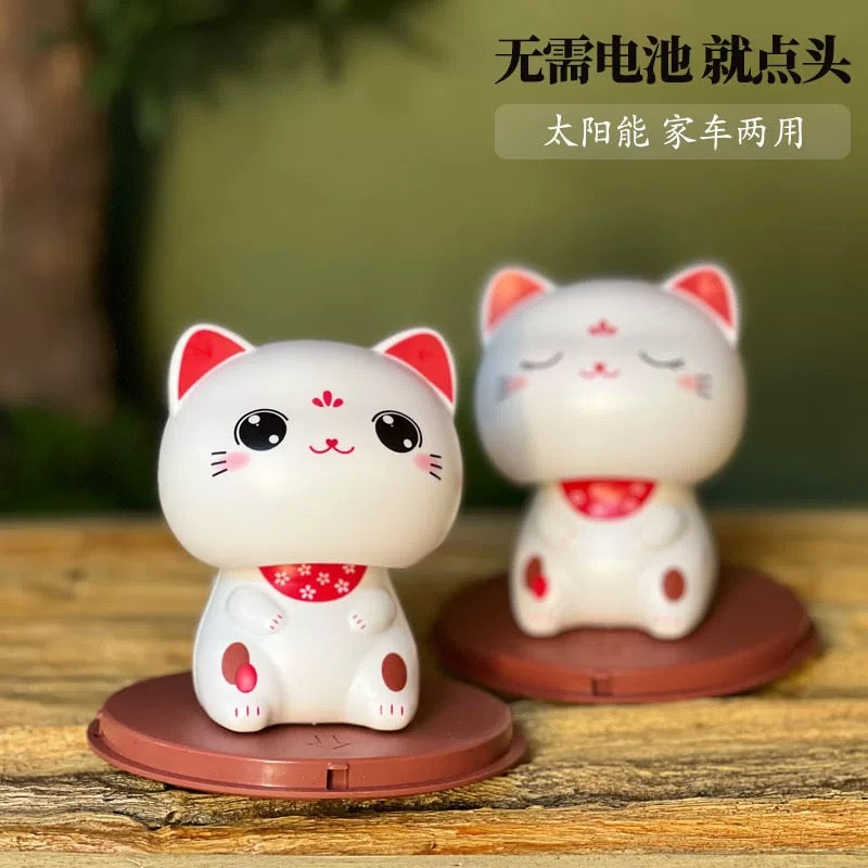 Gatto portafortuna movimento