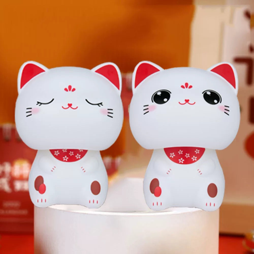 Gatto portafortuna movimento